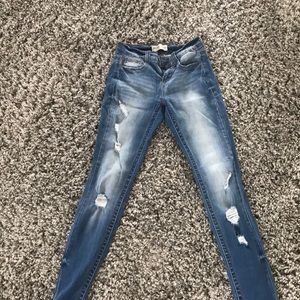 Light washed body flattering ripped jeans